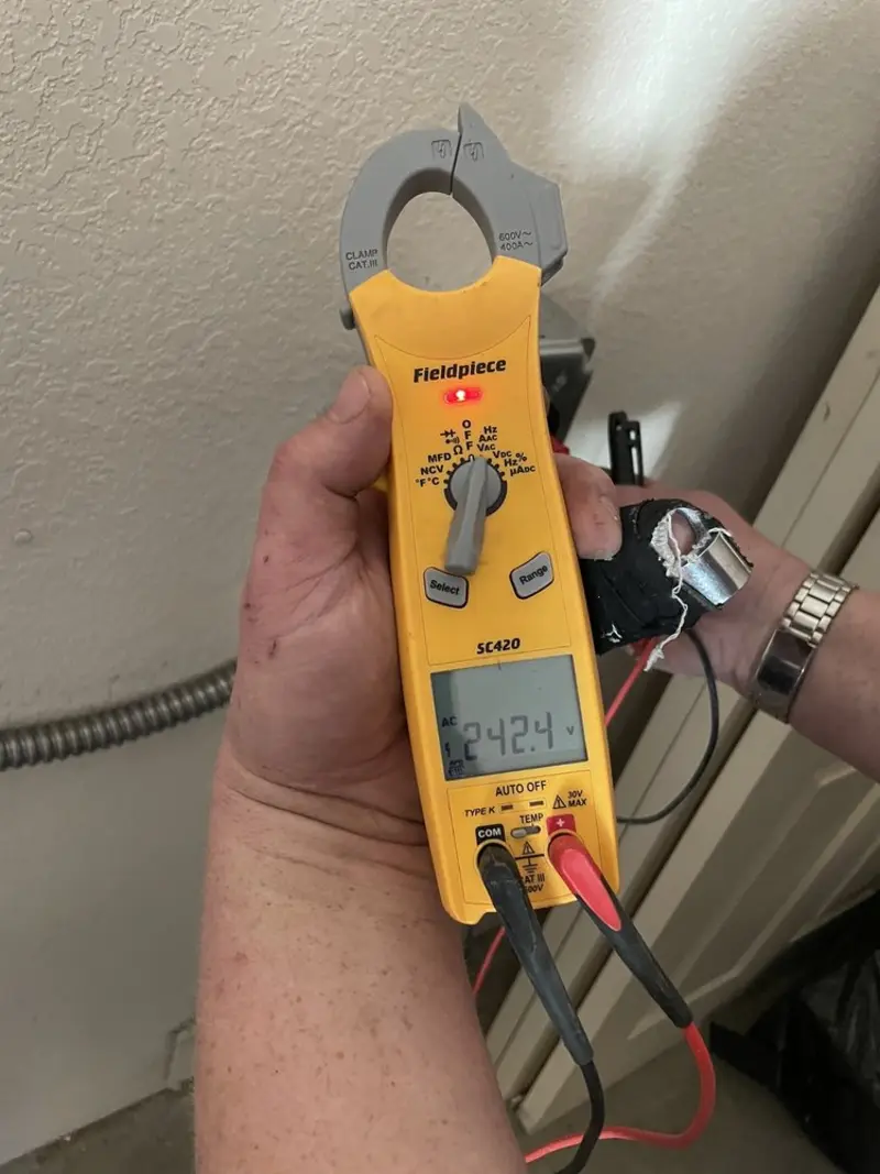 Voltage testing with clamp meter during Generator Installation in Atlantic Highlands